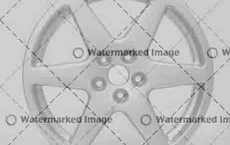 studio photography of a a wheel rim in light back